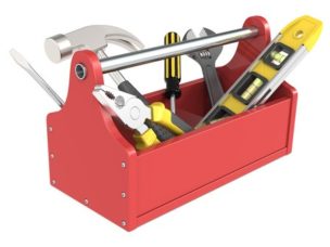 red toolbox with miscellaneous tools inside