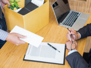 stock photo of handing over resignation letter