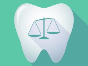 A cartoon of a gigantic white tooth with a justice scale inside, on a mint color background